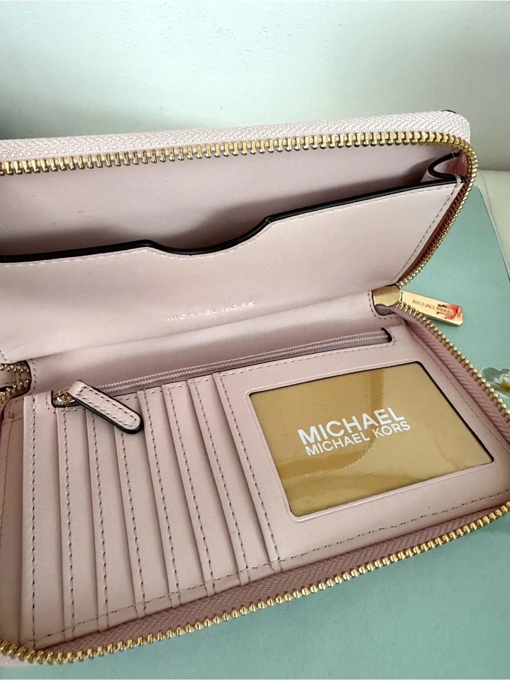 Michael Kors Light Pink Pebbled Leather Zip Wristlet Wallet with Gold Hardware